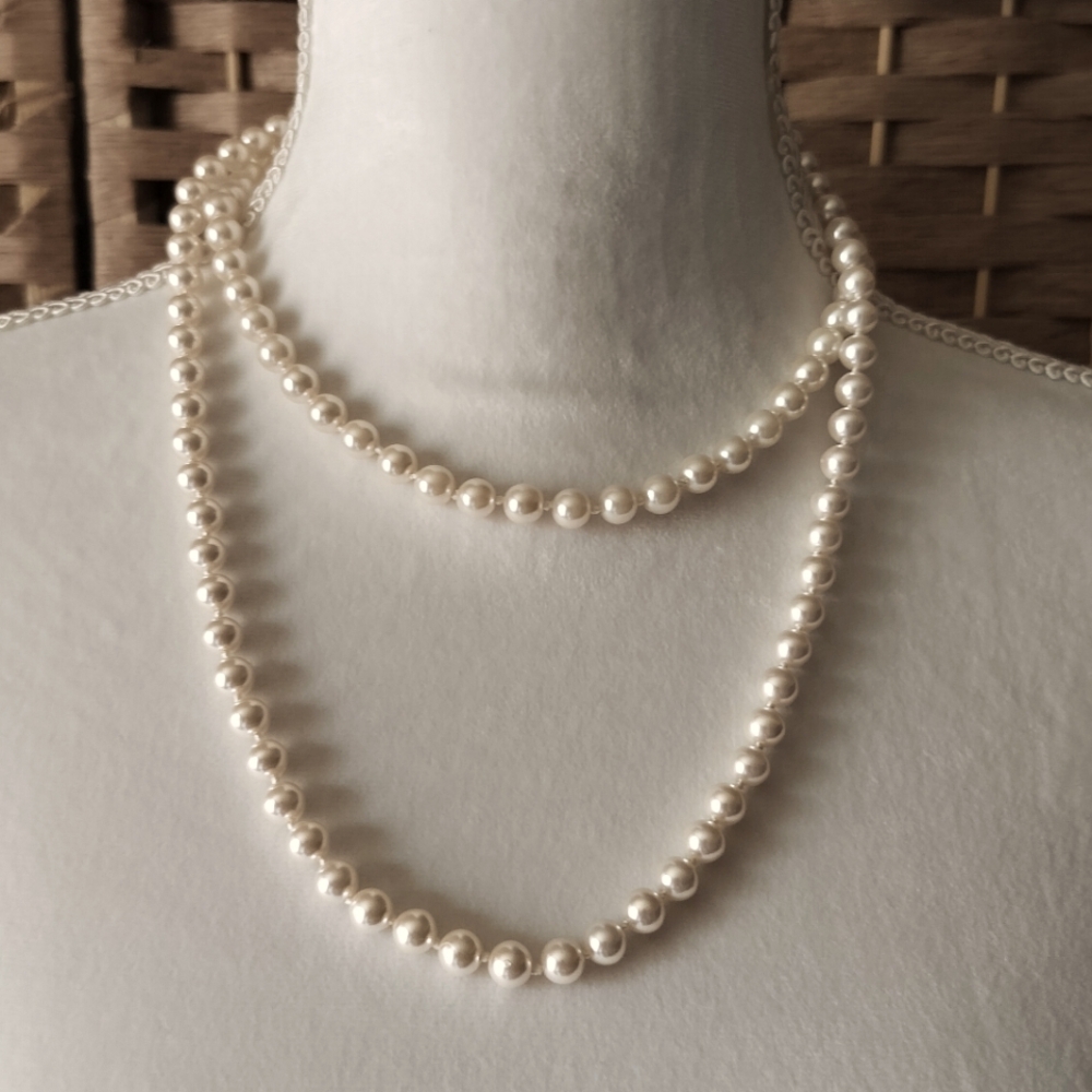 2 strands of faux pearls